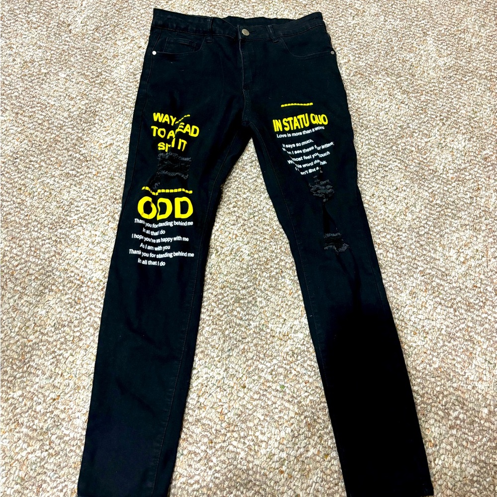 Black jeans with yellow graphic